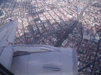 N488UA - a320 wingtip over mexico city - by christian maurer