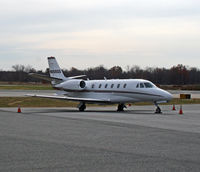 N658QS @ KMMU - Sleek business jet out on the hard stand at Morristown Municipal Airport on a chilly fall Saturday. - by Daniel L. Berek