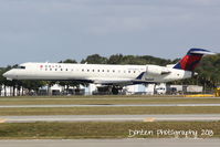 N744EV @ KSRQ - Delta Flight 4935 operated by ExpressJet (N744EV) arrives at Sarasota-Bradenton International Airport following a flight from Laguardia Airport - by Donten Photography