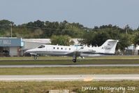 N70AY @ KSRQ - Learjet 31 (N70AY) arrives at Sarasota-Bradenton International Airport - by Donten Photography