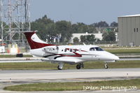 N175EW @ KSRQ - Embraer Phenom 100 (N175EW) taxis at Sarasota-Bradenton International Airport - by Donten Photography