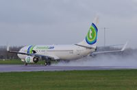 PH-HZE @ EGSH - Taking off from a wet runway 27. - by Graham Reeve