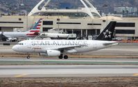 N522TA @ KLAX - Airbus A319 - by Mark Pasqualino