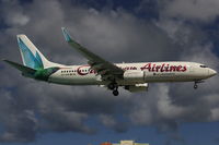 9Y-KIN @ SXM - At famous Maho Beach - by Wolfgang Zilske