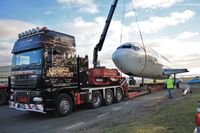 G-CEAH @ EGHH - Being loaded for move to a new life at the museum - by John Coates