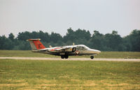 1135 - Saab 105OE of the Austrian Air Force aerial demonstration team in action at the 1977 Intn'l Air Tattoo at RAF Greenham Common. - by Peter Nicholson