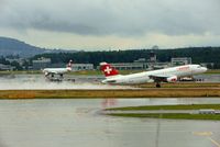 HB-IJU @ LSZH - Swiss Airbus A320-214 taking-off from Zurich-Kloten International Airport during rainy summer day. - by miro susta
