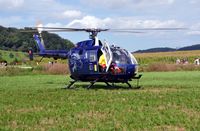 HB-ZJF @ LSZF - Swissheli MBB Bo-105CBS-4 helicopter during air-show at Birrfeld airfield in Switzerland. - by miro susta