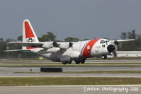1718 @ KSRQ - US Coast Guard HC-130 Hercules (1718) from Air Station Clearwater departs Sarasota-Bradenton International Airport - by Donten Photography