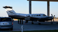 N259G @ KEDC - Unloading aircraft Austin, TX - by Ronald Barker