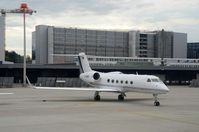 D-AABB @ LSZH - DC Aviation Gulfstream Aerospace airplane parking at Zurich-Kloten International Airport, photo through airplane window. - by miro susta