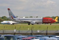 LN-NOU @ EGKK - Waiting to enter 08R - by John Coates