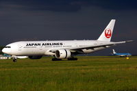 JA706J @ LKPR - Charter landing after evening storm. New color scheme. - by WOM