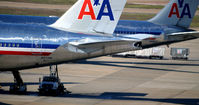 N771AN @ KDFW - Lavatory service DFW TX - by Ronald Barker