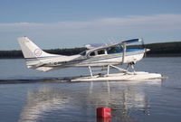 C-FNEQ @ CEZ7 - Taxiing to take off on the Mackenzie River at the Fort Simpson Island Water Aerodrome, NWT. - by Murray Lundberg