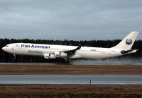 EP-APA @ ARN - Reversing after touch down on runway 26. - by Anders Nilsson