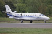 LX-NAT @ EGHH - Taxiing to depart - by John Coates