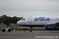 N639JB @ KSRQ - JetBlue Flight 164 (N639JB) A Little Blue Will Do prepares for flight at Sarasota-Bradenton International Airport - by Donten Photography