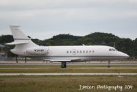 N341AP @ KSRQ - Dassault Falcon 2000EX (N341AP) taxis at Sarasota-Bradenton International Airport - by Donten Photography