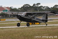 N9NE @ KSRQ - American Champion Scout (N9NE) arrives at Sarasota-Bradenton International Airport - by Donten Photography