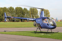 G-BSCE @ EGBR - Robinson R22 Beta at The Real Aeroplane Club's Pre-Hibernation Fly-In, Breighton Airfield, October 2013. - by Malcolm Clarke