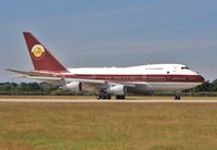 VP-BAT @ EGHH - Resident 747SP backtracking to depart - by John Coates