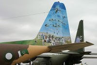64144 @ EGVA - RIAT 2006; on static display. Pakistan AF, showing artwork on port side of tail. RAF C-130K XV307 behind with 40th anniversary artwork. - by Howard J Curtis