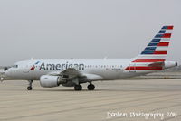 N700UW @ KSRQ - US Air Flight 2090 (N700UW) prepares for flight at Sarasota-Bradenton International Airport - by Donten Photography