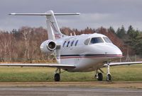 M-PREI @ EGHH - Parked at Jetworks - by John Coates