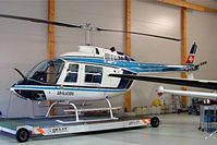 HB-XHO @ LSGC - HB-XHO   Agusta-Bell 206A Jet Ranger [8155] (Air-Glaciers) La Chaux-de-Fonds~HB 09/04/2009 - by Ray Barber