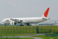JA736J @ LFPG - Boeing 777-346, Max reverse thrust landing Rwy 26L, Roissy Charles De Gaulle Airport (LFPG-CDG) - by Yves-Q