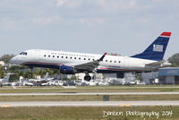 N811MD @ KSRQ - US Air Flight 3404 operated by Republic (N811MD) arrives at Sarasota-Bradenton International Airport following a flight from Reagan National Airport - by Donten Photography