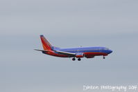 N68SW @ KMCO - Southwest Flight 2487 (N68SW) arrives at Orlando International Airport following a flight from Memphis International Airport - by Donten Photography