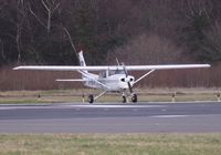 G-BIJV @ EGHH - Taxiing to depart - by John Coates