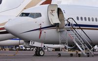 SX-ATF @ EGHH - Spurs taxi on a busy ramp at European - by John Coates