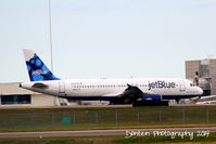 N644JB @ KMCO - JetBlue Flight 352 (N644JB) Blue Loves Ya Baby? taxis for flight at Orlando International Airport - by Donten Photography