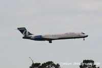 N932AT @ KMCO - AirTran Flight 497 (N932AT) arrives at Orlando International Airport following a flight from Hartsfield-Jackson Atlanta International Airport - by Donten Photography