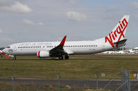 VH-YVC @ YSSY - taxiing to 34R - by Bill Mallinson