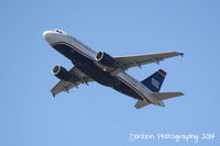 N713UW @ KSRQ - US Air Flight 1801 (N713UW) departs Sarasota-Bradenton International Airport enroute to Charlotte-Douglas International Airport - by Donten Photography
