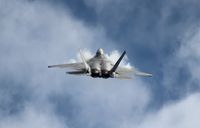 03-4042 - F-22 over Cocoa Beach - by Florida Metal