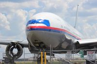 9M-MRK @ SFB - Malaysia Airlines 777-200 getting scrapped - by Florida Metal