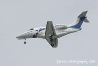 N636SD @ KSRQ - Embraer Phenom 100 (N636SD) arrives at Sarasota-Bradenton International Airport following a flight from Harrison County Airport - by Donten Photography