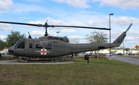 69-15171 @ VPS - UH-1H Iroquois in front of the Ft. Walton Beach Airport terminal - by Florida Metal