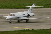 HB-VOB @ LFML - Raytheon Hawker 800XP, Taxiing to holding point Rwy 31R, Marseille-Marignane Airport (LFML-MRS) - by Yves-Q