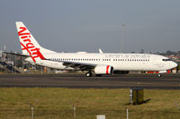 VH-VOQ @ YSSY - taxiing from 34R - by Bill Mallinson