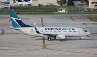 C-GWJK @ FLL - West Jet 737-700 - by Florida Metal