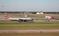 G-VIIV @ TPA - British 777 and Edelweiss A330-300 about to meet face to face - by Florida Metal