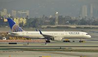 N17128 @ KLAX - Taxiing to gate at LAX - by Todd Royer