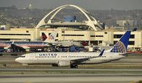 N35204 @ KLAX - Taxiing to gate at LAX - by Todd Royer