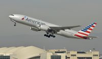 N772AN @ KLAX - Departing LAX on 25R - by Todd Royer